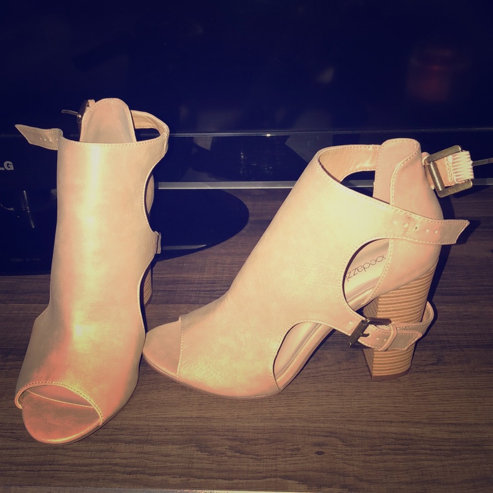 Cute open toe booties.  Never worn.